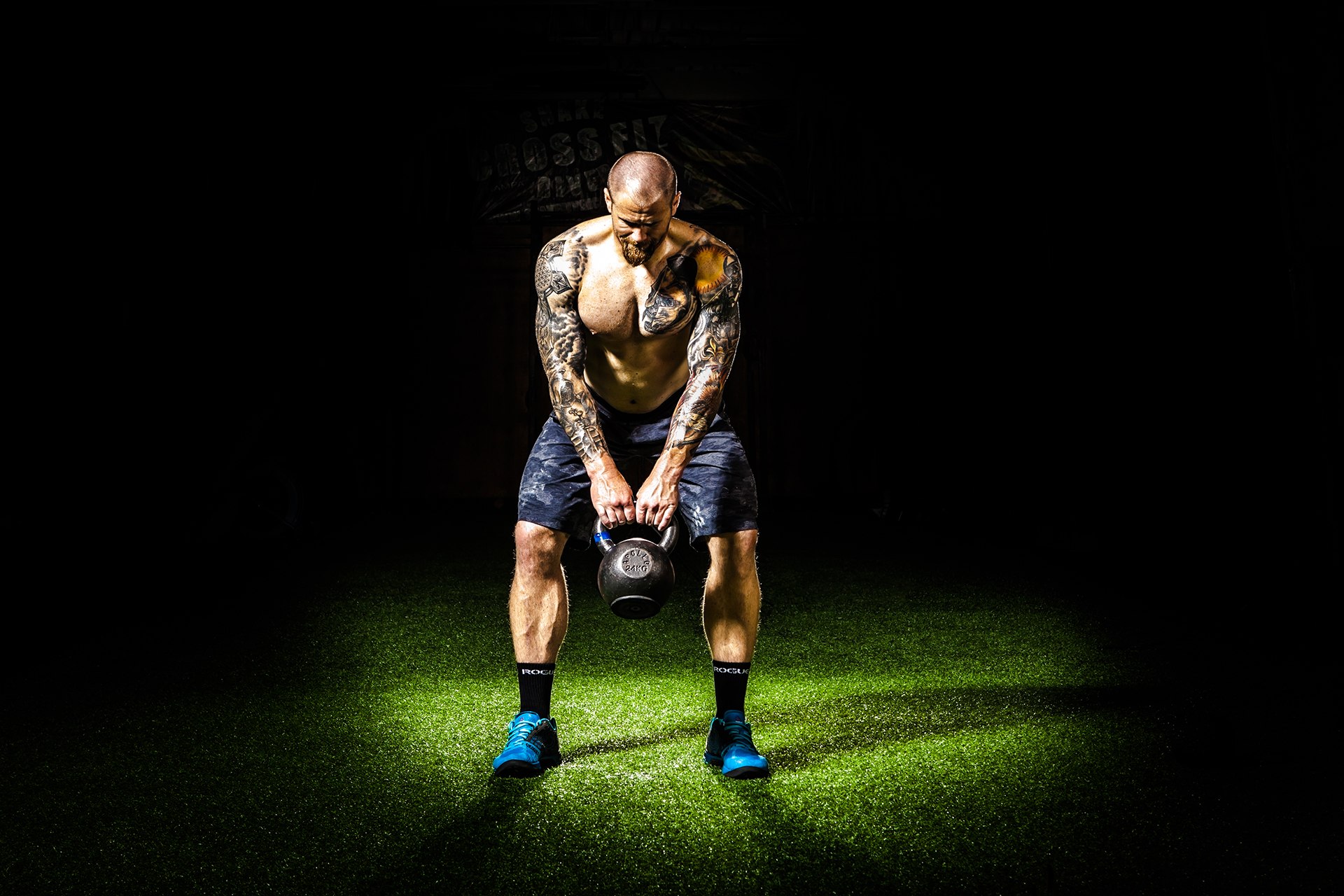 Man doing an exercise with a kettlebell